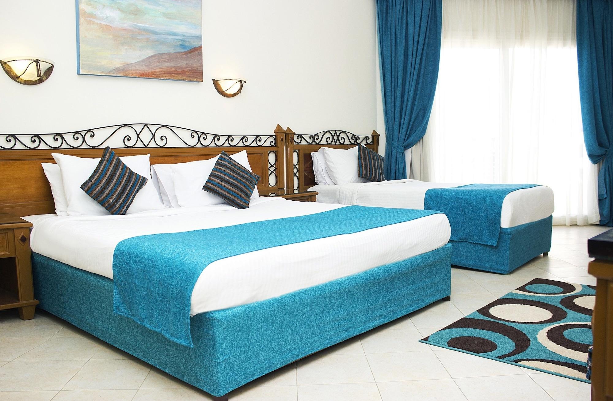 Pyramisa Beach Resort Sahl Hasheesh Hurghada Exterior photo A bedroom in a hotel